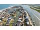 Stunning aerial view of a coastal community and waterways at 1885 Pompano Dr., Garden City Beach, SC 29576