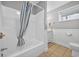 Cozy bathroom features a shower and tub combination, vanity, and neutral color palette at 1885 Pompano Dr., Garden City Beach, SC 29576