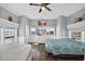 Bright and airy bedroom with hardwood floors, water views, and ample natural light at 1885 Pompano Dr., Garden City Beach, SC 29576