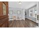Inviting foyer with hardwood floors and beachy decor at 1885 Pompano Dr., Garden City Beach, SC 29576