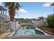 Relaxing hot tub overlooking the water and serene scenery at 1885 Pompano Dr., Garden City Beach, SC 29576