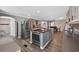 Large kitchen features an island with cooktop and stainless appliances at 1885 Pompano Dr., Garden City Beach, SC 29576