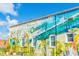 A colorful mural reading 'Welcome to Conway' adorns the side of a brick building in historic Conway, SC at 216 Palm Terrace Loop, Conway, SC 29526
