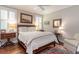 Bedroom showcasing hardwood floors, a ceiling fan, and ample natural light at 226 Red Tail Hawk Loop, Pawleys Island, SC 29585