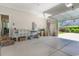 Open garage space with storage and access to the outdoors at 226 Red Tail Hawk Loop, Pawleys Island, SC 29585