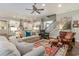 Open-concept living room flows into the kitchen and features hardwood floors at 226 Red Tail Hawk Loop, Pawleys Island, SC 29585
