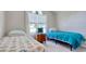 Bright bedroom with two twin beds and a window, perfect for guests or children at 23 Robert Conway Ct., Georgetown, SC 29440
