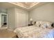 Bedroom with a comfortable bed, a closet, and floral wallpaper at 23 Robert Conway Ct., Georgetown, SC 29440