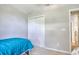 Neutral bedroom with a twin bed and a spacious closet for ample storage at 23 Robert Conway Ct., Georgetown, SC 29440