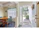 Welcoming foyer featuring an open view to the front yard, a table and chairs and natural light at 23 Robert Conway Ct., Georgetown, SC 29440