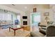 Open-concept living space featuring comfortable seating and a fireplace at 23 Robert Conway Ct., Georgetown, SC 29440