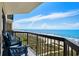 Relax on this balcony with chairs, where you can enjoy the ocean, the beach, and the sunshine at 2501 S Ocean Blvd. # 508, North Myrtle Beach, SC 29582