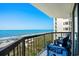 Enjoy stunning ocean views from the balcony, equipped with cozy chairs for relaxation and serenity at 2501 S Ocean Blvd. # 508, North Myrtle Beach, SC 29582