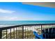 Breathtaking balcony view of the beach, ocean, and sky, complete with comfortable seating at 2501 S Ocean Blvd. # 508, North Myrtle Beach, SC 29582