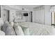 Bright bedroom featuring patterned bedding, mirrored dresser, and ample closet space for a relaxing retreat at 2501 S Ocean Blvd. # 508, North Myrtle Beach, SC 29582