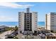 High-rise building with ocean views, offering modern architecture and a prime location near the beach at 2501 S Ocean Blvd. # 508, North Myrtle Beach, SC 29582