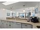 Open-concept kitchen with a breakfast bar overlooking the ocean view and living space at 2501 S Ocean Blvd. # 508, North Myrtle Beach, SC 29582