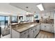 Open kitchen featuring stainless steel appliances, granite countertops, and a breakfast bar with seating at 2501 S Ocean Blvd. # 508, North Myrtle Beach, SC 29582