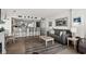 Open-concept living area featuring a fireplace and a breakfast bar at 2501 S Ocean Blvd. # 508, North Myrtle Beach, SC 29582