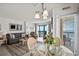 Bright living room featuring comfortable seating, a dining area and balcony access with ocean views at 2501 S Ocean Blvd. # 508, North Myrtle Beach, SC 29582