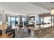 Open living room offering ocean views, comfortable seating, and access to the balcony at 2501 S Ocean Blvd. # 508, North Myrtle Beach, SC 29582