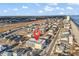 Aerial view of condo building close to the beach at 301 N Waccamaw Dr. # 311, Garden City Beach, SC 29576