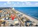 Aerial view of condos located across the street from the beach at 301 N Waccamaw Dr. # 311, Garden City Beach, SC 29576