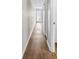 Bright hallway with new flooring and neutral walls, leading to the living areas at 301 N Waccamaw Dr. # 311, Garden City Beach, SC 29576