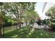 Lush backyard with an iron fence, patio and manicured landscaping, ideal for outdoor enjoyment at 417 Pennington Loop, Myrtle Beach, SC 29588