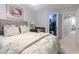 Bedroom with a closet visible through doorway, neutral walls, and plush bedding at 417 Pennington Loop, Myrtle Beach, SC 29588