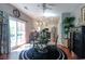 Bright dining area featuring a glass table and chairs, next to sliding glass doors to the backyard at 417 Pennington Loop, Myrtle Beach, SC 29588