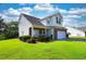Charming two-story home with a manicured lawn, showcasing curb appeal at 417 Pennington Loop, Myrtle Beach, SC 29588