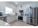 Kitchen featuring stainless steel appliances, light backsplash, and modern design at 417 Pennington Loop, Myrtle Beach, SC 29588