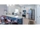 Modern kitchen with white cabinets, stainless steel appliances, and granite countertops at 417 Pennington Loop, Myrtle Beach, SC 29588