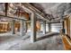 This unfinished basement shows concrete columns and ductwork, offering a blank slate for customization and future living space at 4490 Barcelona Ln., Little River, SC 29566