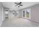 Expansive bedroom with outdoor access to balcony and seating area and full bath at 4490 Barcelona Ln., Little River, SC 29566
