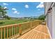 Wooden deck overlooking grassy landscape at 4490 Barcelona Ln., Little River, SC 29566