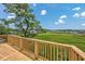 Wooden deck overlooking grassy landscape at 4490 Barcelona Ln., Little River, SC 29566