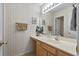 Bright bathroom with a large mirror, vanity and ample counter space at 493 White River Dr. # 28-D, Myrtle Beach, SC 29579
