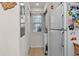 Convenient laundry area equipped with a washer, dryer, and storage options at 493 White River Dr. # 28-D, Myrtle Beach, SC 29579