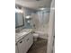 Well-lit bathroom with a modern vanity and shower-tub combo at 504 Ocean Blvd. N # 410, Myrtle Beach, SC 29577