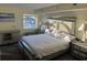 Bedroom with a decorative headboard and a beachy decor at 504 Ocean Blvd. N # 410, Myrtle Beach, SC 29577