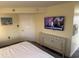 Bedroom featuring a tv and a decorative table at 504 Ocean Blvd. N # 410, Myrtle Beach, SC 29577