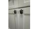 Detailed view of cabinet hardware turtle design on white cabinets at 504 Ocean Blvd. N # 410, Myrtle Beach, SC 29577