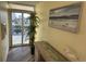 Hallway featuring a tropical plant and a view of the balcony at 504 Ocean Blvd. N # 410, Myrtle Beach, SC 29577