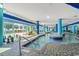 Indoor pool with seating overlooking the ocean at 504 Ocean Blvd. N # 410, Myrtle Beach, SC 29577