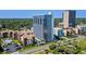 Aerial shot showcasing the condo building with views of surrounding trees and landscape at 5511 N Ocean Blvd. # 902, Myrtle Beach, SC 29577