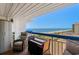 Outdoor seating on balcony with ocean view at 5511 N Ocean Blvd. # 902, Myrtle Beach, SC 29577