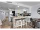 Bright kitchen boasts stainless steel appliances, a marble backsplash, and a breakfast bar at 5511 N Ocean Blvd. # 902, Myrtle Beach, SC 29577