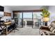 Cozy living room with ocean view and a sliding glass door to the balcony at 5511 N Ocean Blvd. # 902, Myrtle Beach, SC 29577